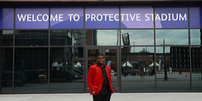 Birmingham student Trysten Manning standing outside Protective Stadium