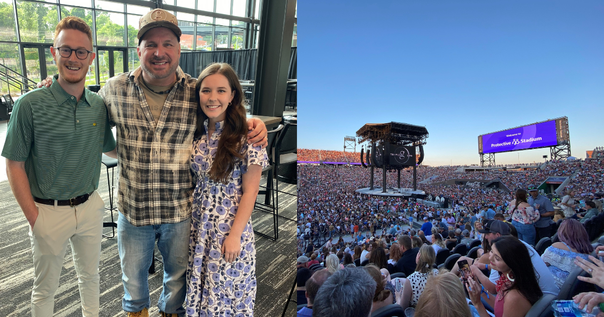 Garth Brooks poses with Protective employee and snapshot of Protective Stadium during the Garth Brooks concert.