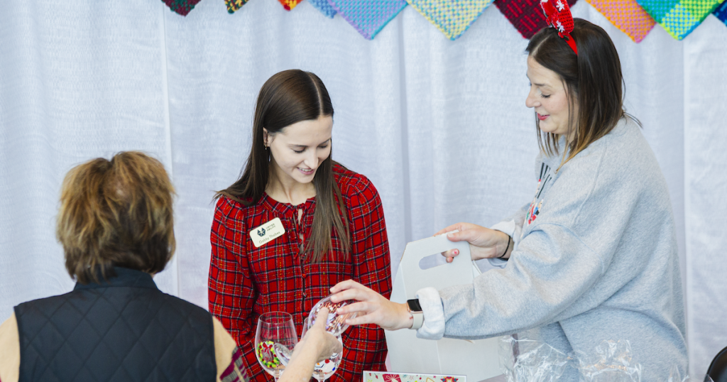 Customers enjoying the Protective Holiday Market