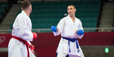 Stanislav Horuna looking at opponent in karate competition