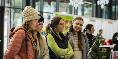 Four young ladies enjoying the Protective Holiday Market