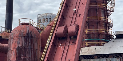 Sloss Furnace with sky and clouds in background